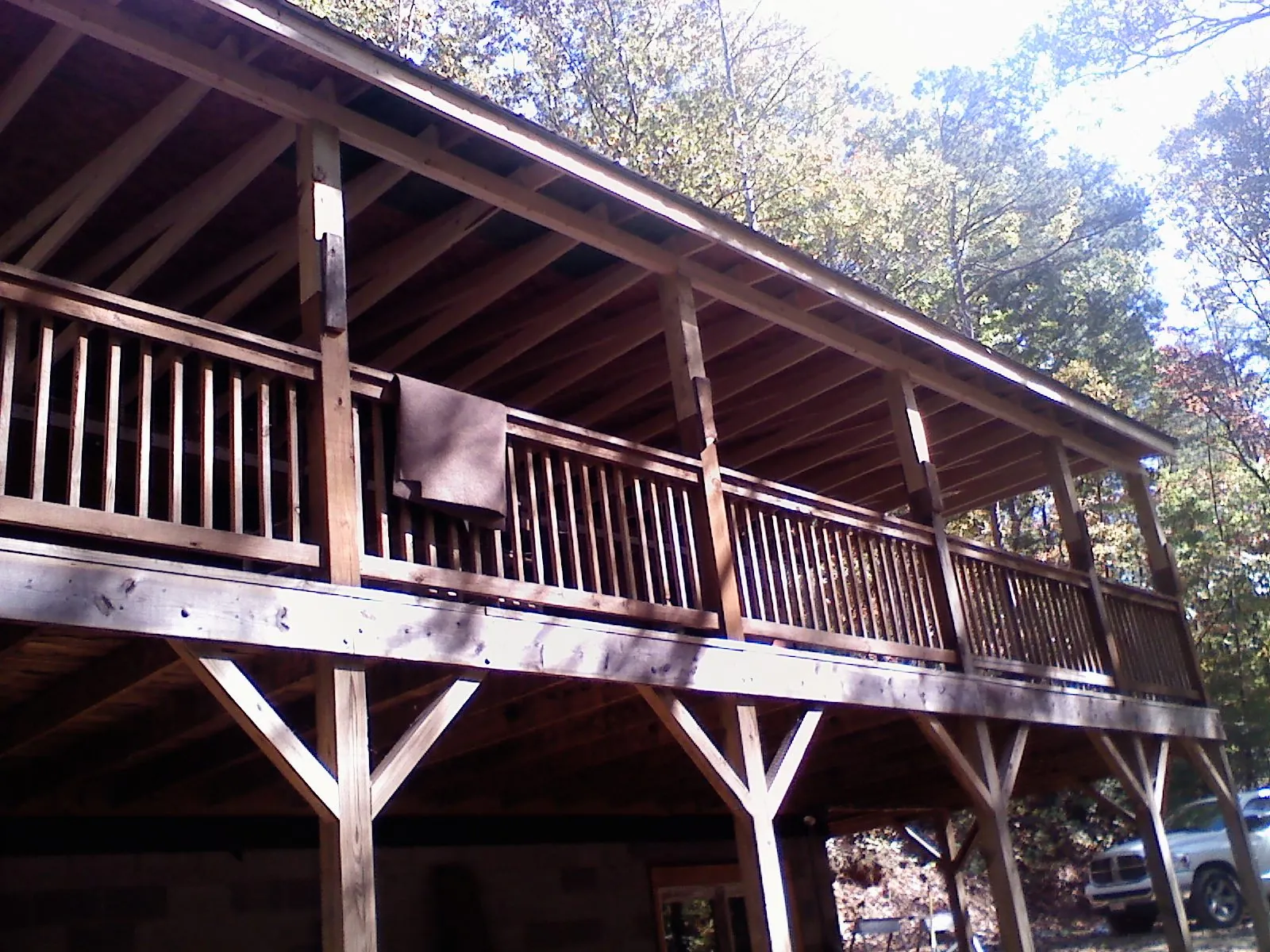 Timber framing under a new elevated porch and deck — Roof Leak Repair in Jupiter by Roofing Brothers